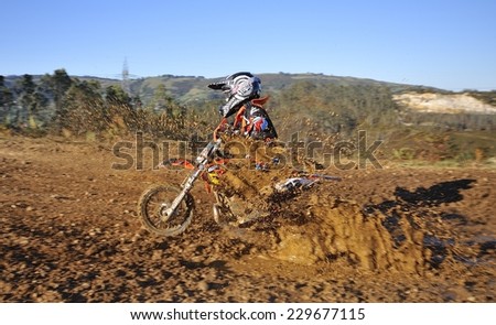 NAVA, SPAIN - OCTOBER 18: Ribuli motocross in October 18, 2014 in Nava, Spain. Motorcycle Rider Enol Vallin Gancedo in the bike race.