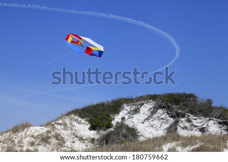 Colorful Kites Flying Over the Sand Dunes