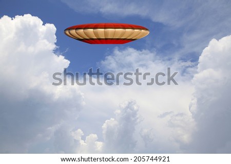 Red Flying Saucer UFO Flying Among the Clouds,
