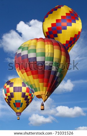 Colorful Hot Air Balloons in a Beautiful Cloudy Sky