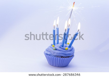 Birthday Blue Cupcake with Candles and Sparklers