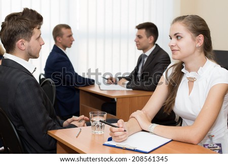 Business interview. A few applicants are passing interview at the office