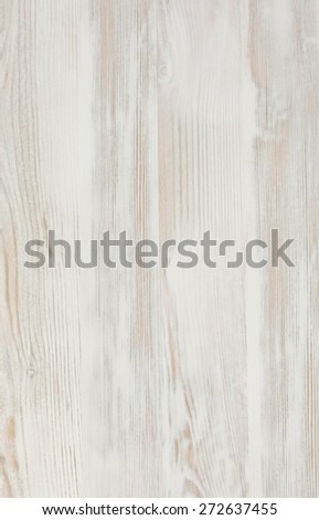 Vertical textured wooden plank. Image of natural wooden shape in warm light brown tones