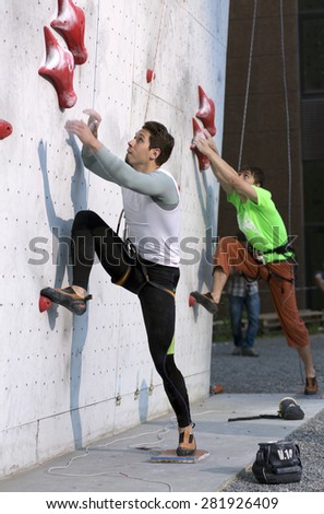 Young athletes starting the run of speed climbing competitions. National Climbing Championship, Dnepropetrovsk, Ukraine, May 23, 2015, Speed climbing, male Final