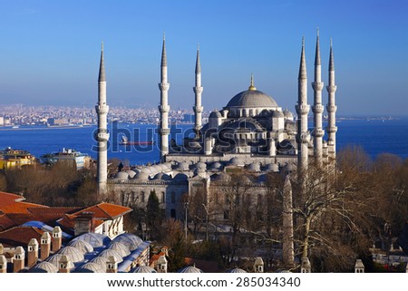 Sultan Ahmed Mosque in Istanbul city. Blue Mosque most famous Ottoman Cathedral in Istanbul old city district square popular touristic destination blue sky and Bosporus channel on background