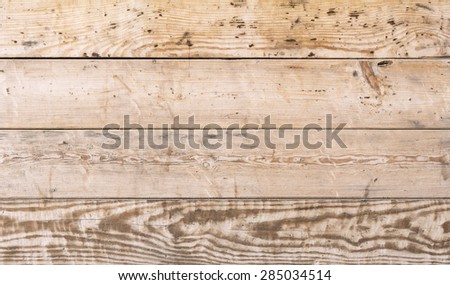 Wood plank red cool tone texture background horizontal direction. Image of pine tree natural gnarled planks siding with well visible texture in cooler tone with red tint.