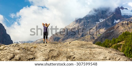 Young Woman Doing Morning Fitness Outdoor in Mountain Landscape