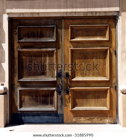 Full length weathered wooden double doors
