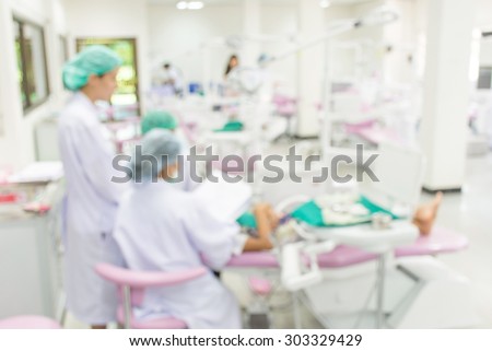 Blurred image of dentist team working background