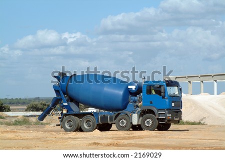 Blue concrete truck mixer in the workmanship