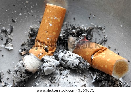 Cigarette butt in the ashtray,  unhealthy life style concept