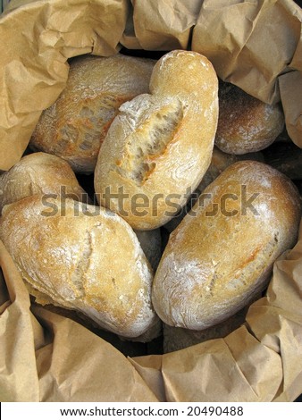 Fresh and delicious bread in a paper bag