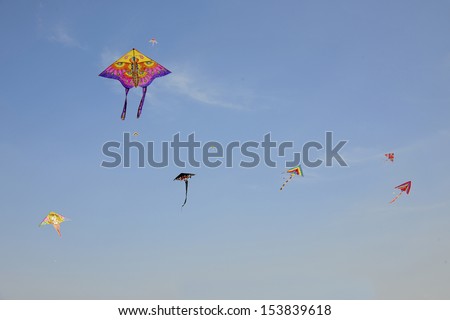 Under the blue sky flying kites