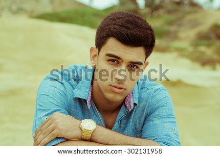 Young handsome male with dark hair and dark eyes