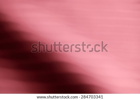 abstract blur wave on pink background, out of focus