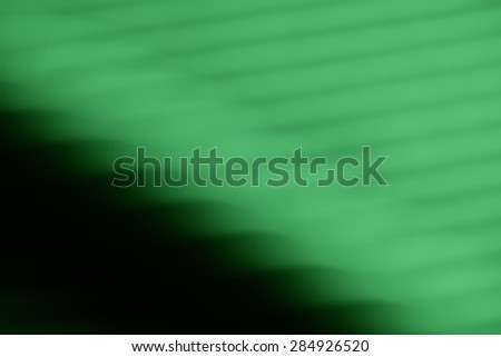 abstract blur wave on green background, out of focus