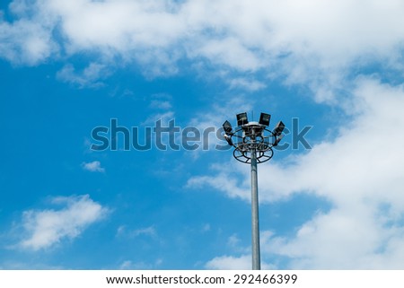 Light stadium or Sports lighting on cloudy sky background