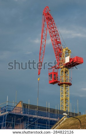 Rye, East Sussex, 5 June, 2015, Industrial crane on the skyline building new residential properties.