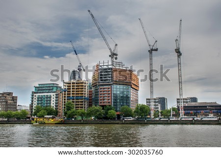 London, UK, 26 June, 2015, Construction cranes on the skyline above the River Thames