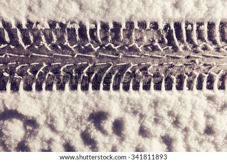 Winter tire print in the snow in Finland. Image includes a effect.