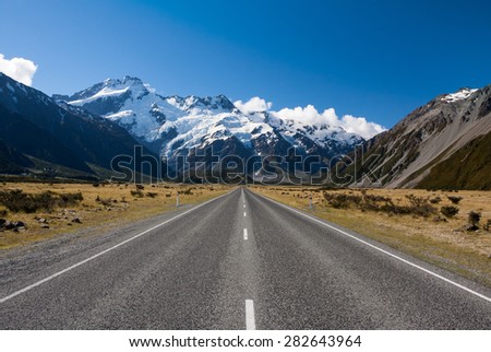 Straight road to the mountains