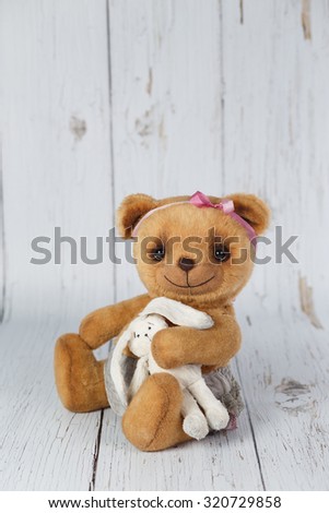 Brown artist teddy bear in dress one of kind.