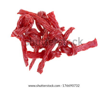 A group of red licorice on a white background.