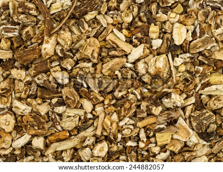 A very close view of dried and chopped dandelion root.
