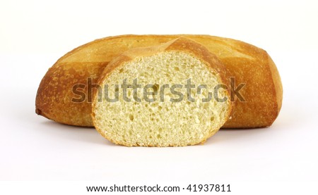 stock photo : Sourdough bread loaf with single slice in the foreground stock photo : Sourdough bread loaf with single slice in the foreground