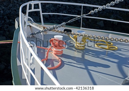 Clean uncluttered foredeck of a work boat
