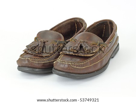 white tassel loafers. stock photo : Old leather tassel loafers