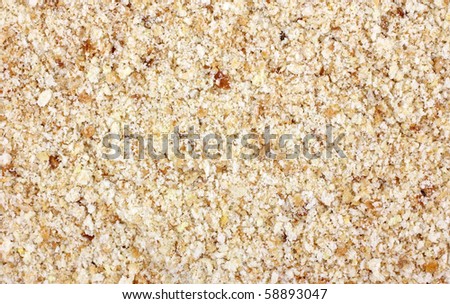 Close view of a layer of seasoned bread crumbs.