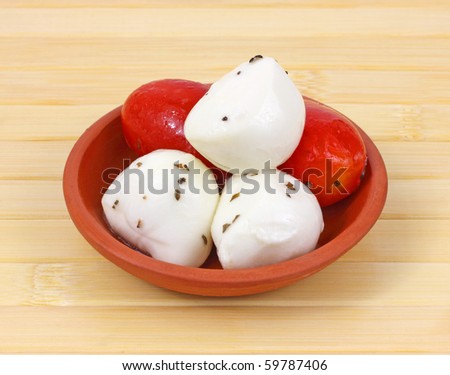 Marinated tomatoes and mozzarella balls