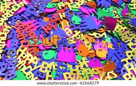 Colorful close view of birthday party confetti.
