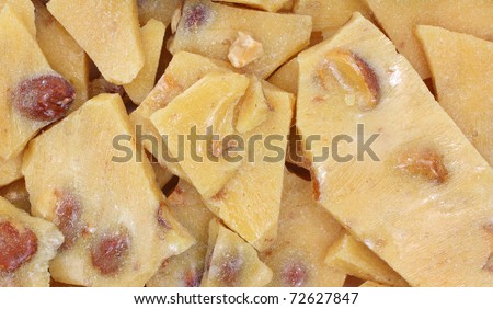 A very close view of peanut brittle candy.