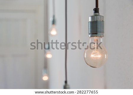 Dimmed light bulbs, subtle glowing.