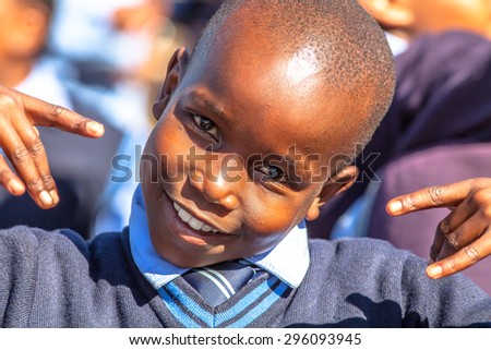 Blyde River Canyon Nature Reserve, South Africa - August 22, 2014: Portrait of a smiling South African child in school uniform.