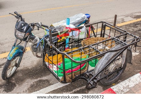 Chiang Mai, Thailand - July 23, 2011: Thai bike parked on the street in  town.