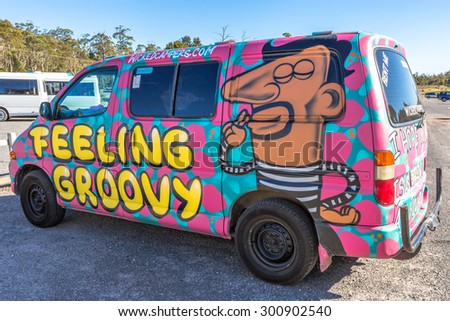 Sydney, Australia - January 9, 2015: Hippie van with Feeling Groovy airbrushing hand made. Typical campers from Australian company: Wickedcampers.