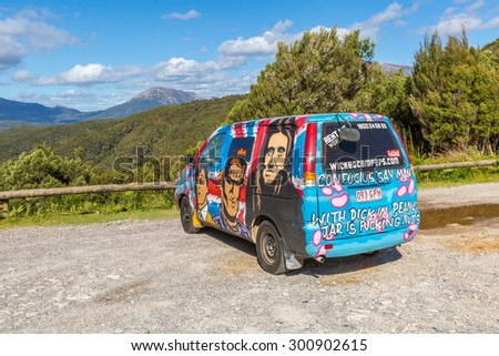 Sydney, Australia - January 9, 2015: Hippie van with Nasty Boys airbrushing hand made. Typical campers from Australian company: Wickedcampers.