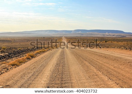 Gravel road to the Fish River Canyon, south of Namibia, Africa. Dry season.