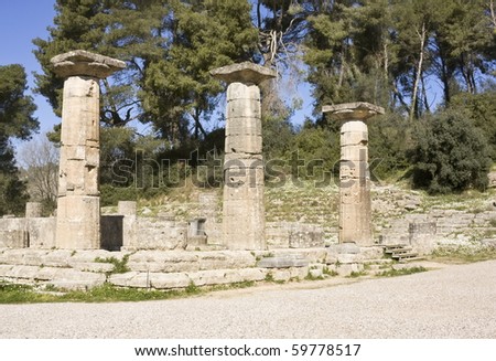 Doric columns of the ruins of a temple in ancient Olympia, the birthplace of the Olympic Games