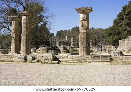 Doric columns of the ruins of a temple in ancient Olympia, the birthplace of the Olympic Games