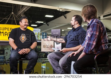July 10, 2015: San Diego Comic Con, the annual pop culture and fandom convention in San Diego, California. Boom Studios Mel Caylo being interviewed at the Games Radar and Loot Crate booth.