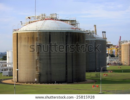 Large concrete storage tanks at container port
