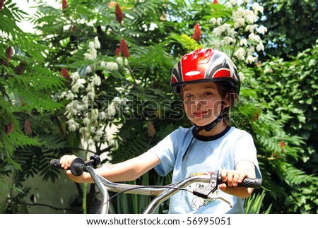 Boy with a bike helmet