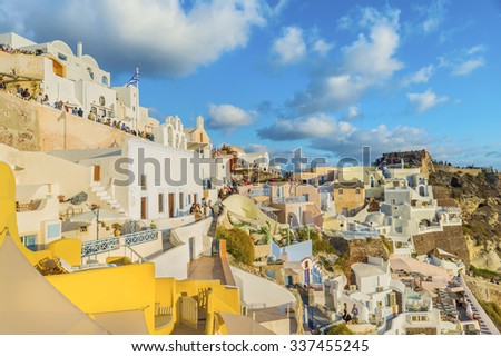 OIA.GREECE-SEPTEMBER 30,2015:Oia village evening before the sunset. One of the best places in the world to meet the sunset.Panoramic view. Island of Santorini(Thira).Cyclades.Europe.