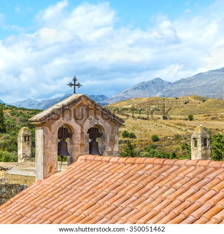 The vintage belfry of orthodox church at the lower Monastery of St.John the Baptist,is part complex of the Patriarchal Preveli Monastery of St. John the Theologian( Monastery of Preveli).Crete.Greece.
