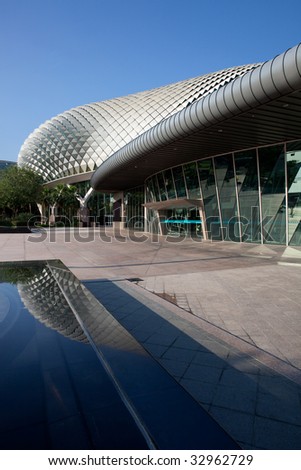 View the Esplanade Theatre, Singapore reflected in water