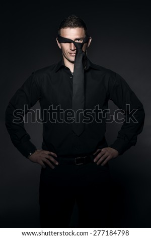 Funny handsome man in black shirt